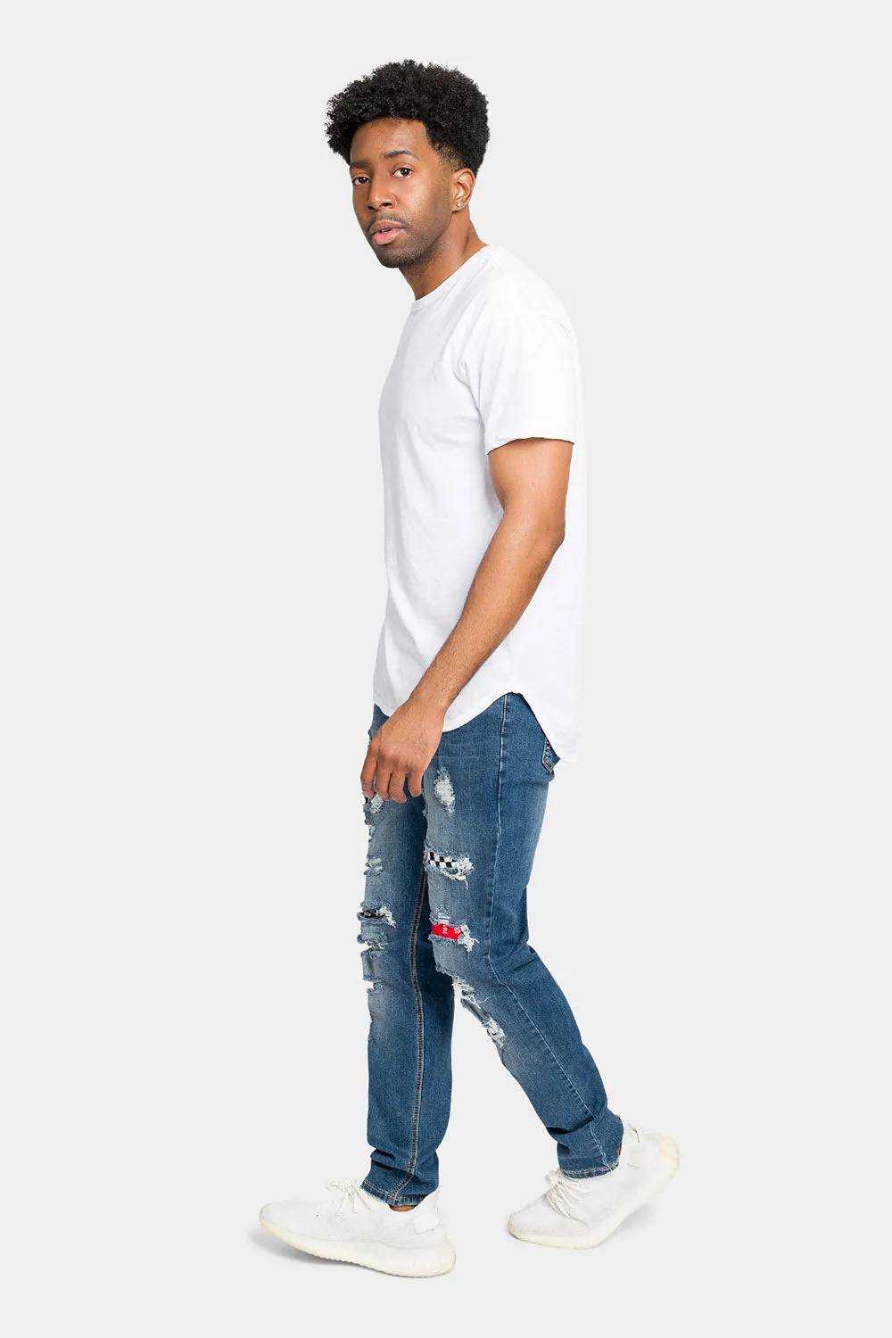 Distressed Patterned Patchwork Denim Jeans